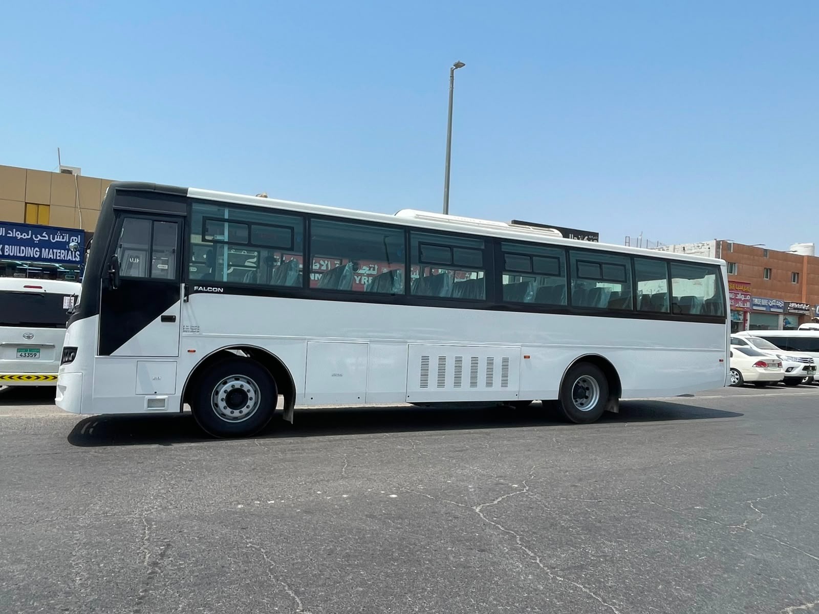 Bright Gold staff transport bus parked in Mussafah, Abu Dhabi